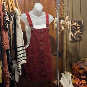 Forever 21 Suede overalls sized to fit a Small and it has pockets!